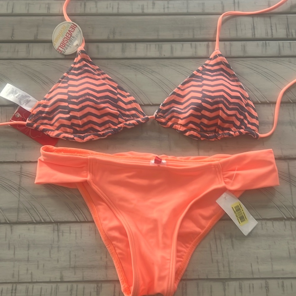 Reversible triangle top bikini. Size medium. NWT